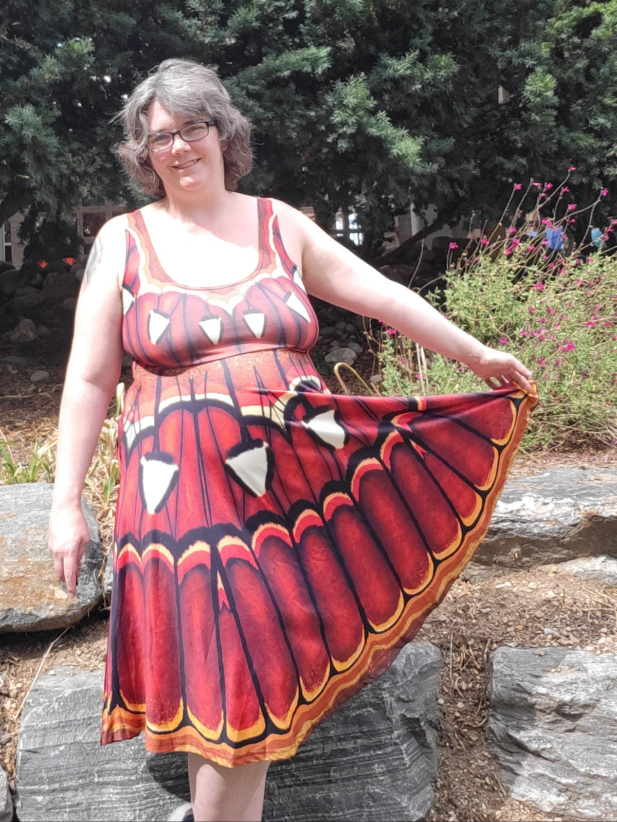 Atlas Moth dress in russet featuring an orange and black moth wing pattern with a sleeveless, scoop neckline design.
